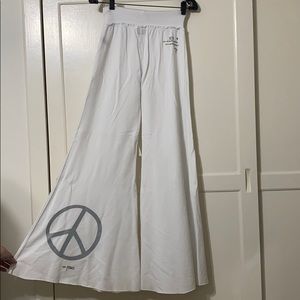 NEVER WORN PEACE LOVE WORLD